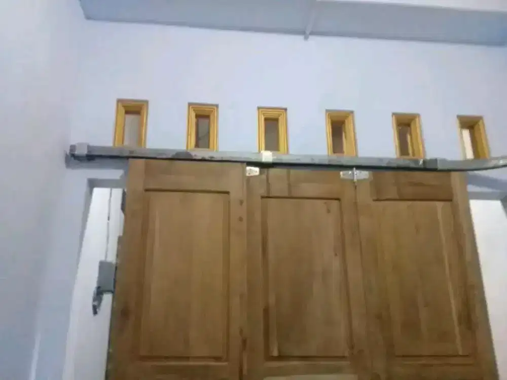 PINTU GARASI KAYU JATI