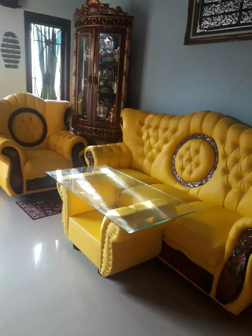 Sofa raja kancing