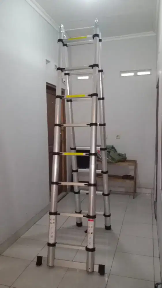 Tangga Teleskopik Double 2,5mtr x 2,5mtr kondisi baru