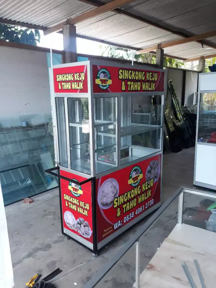 Etalase tahu walik free desain dan cetak banner gerobak both jajanan