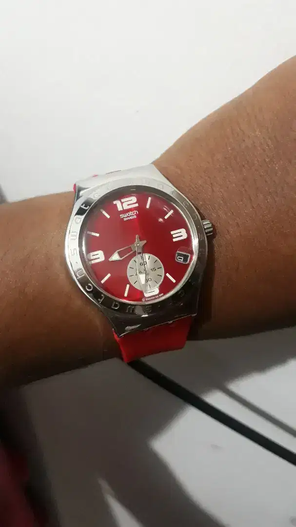 Jam tangan Swatch AG-2004 SR936SW Irony Red dial.