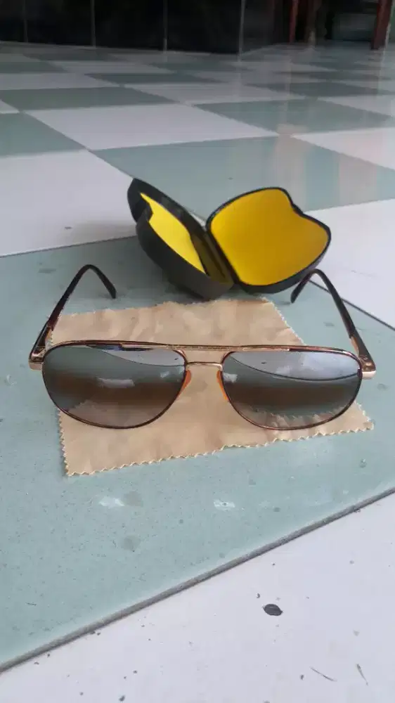 Kaca mata merk DOMONO