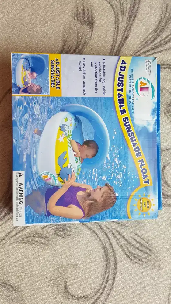 Ban Pelampung Dengan Tudung Kepala