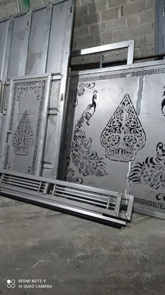 pintu pagar besi dg motif cuting plasma