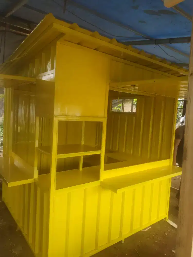 Booth contener dan olahan jati belanda