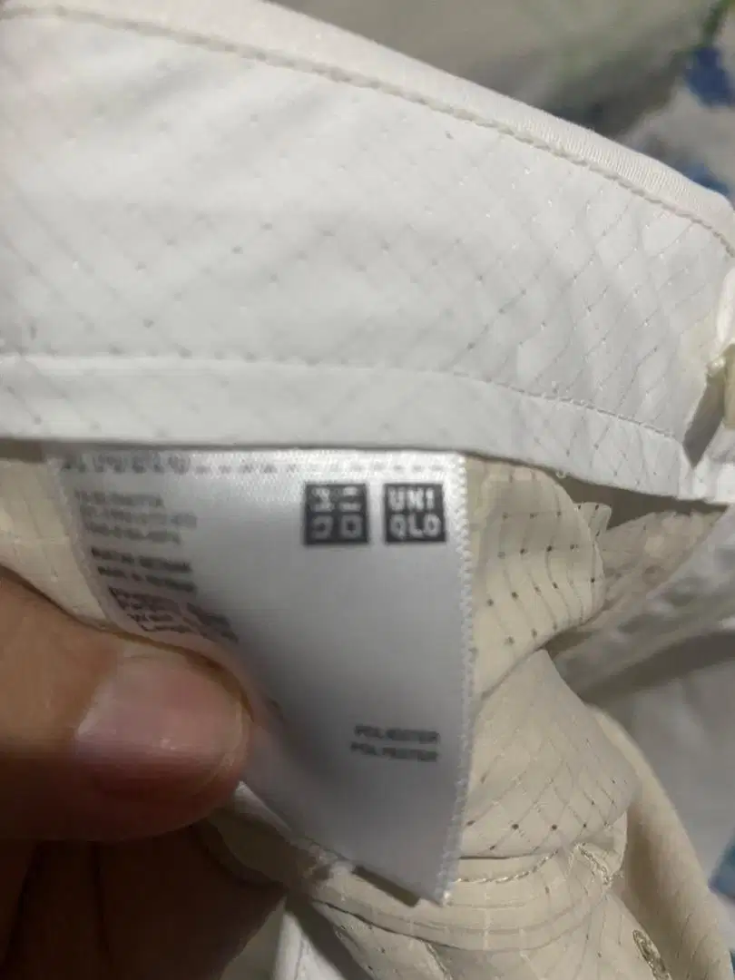 Celana panjang warna putih merk UNI   QLO size  5