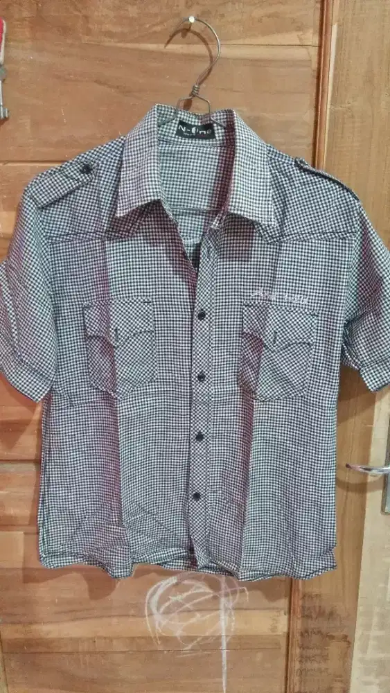 Kemeja katun No one mulus