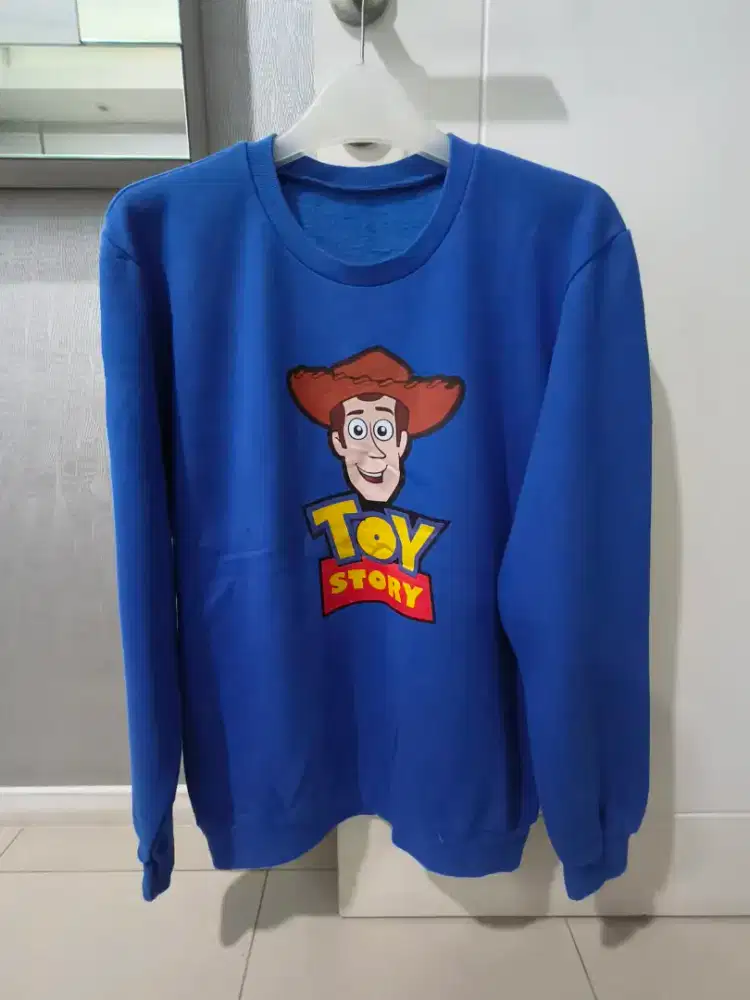154.  Crewneck Toys Story'