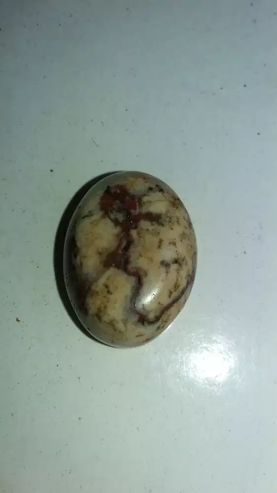 Batu motif gambar blum di ikat