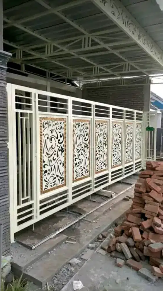 pagar besi holo galpanis motip  cating