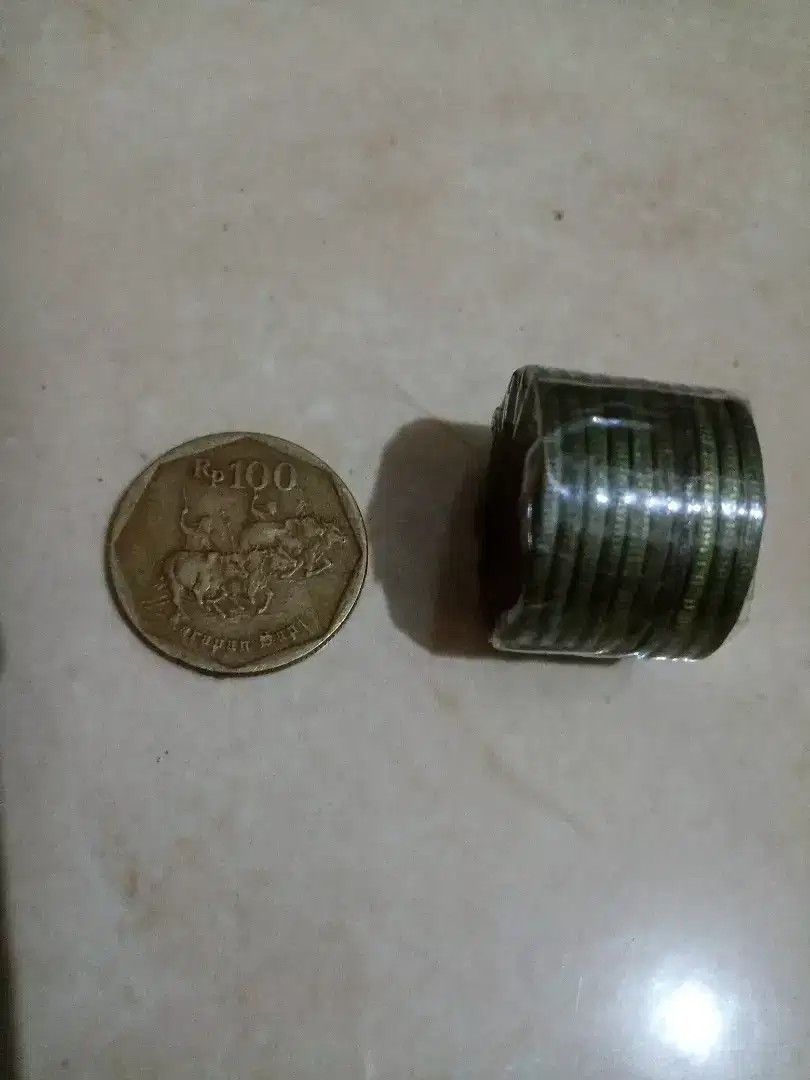 Uang Koin 100 Karapan Sapi