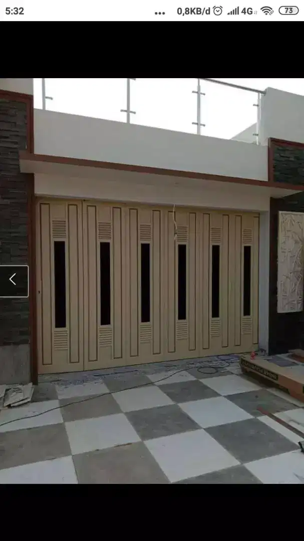 Pintu gerbang garasi ruko