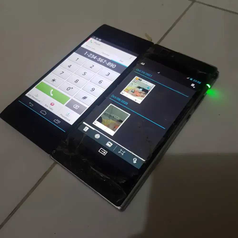 Handphone docomo fold lipat dual screen k zoom