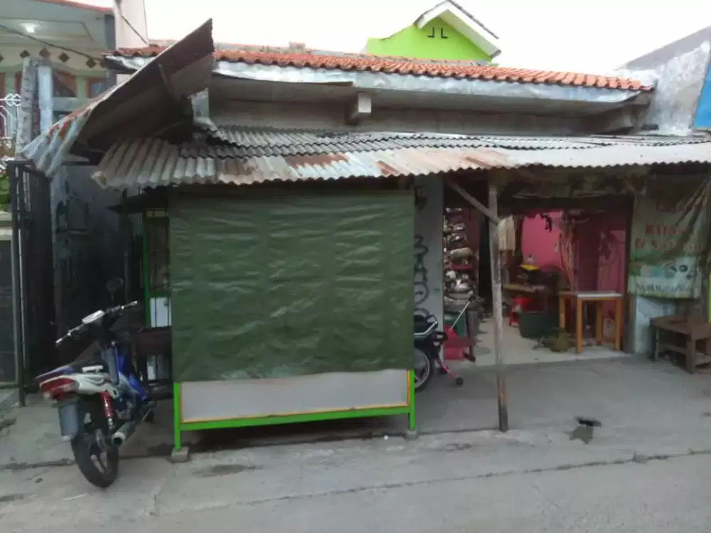 Dijual kontrakan 7 pintu dan 2 kios..lokasi strategis,..