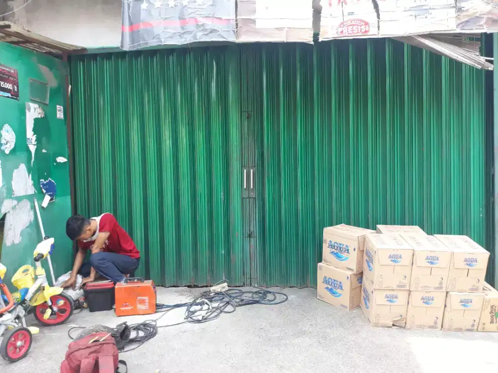 Perbaikan Folding gate rolling door galaxsi