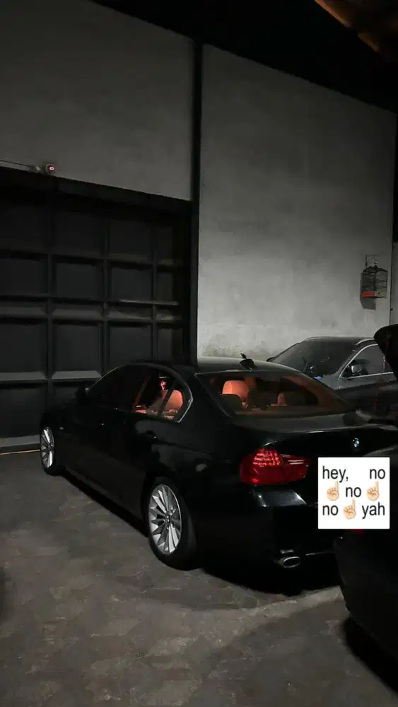 BMW 320i 2010 Bensin