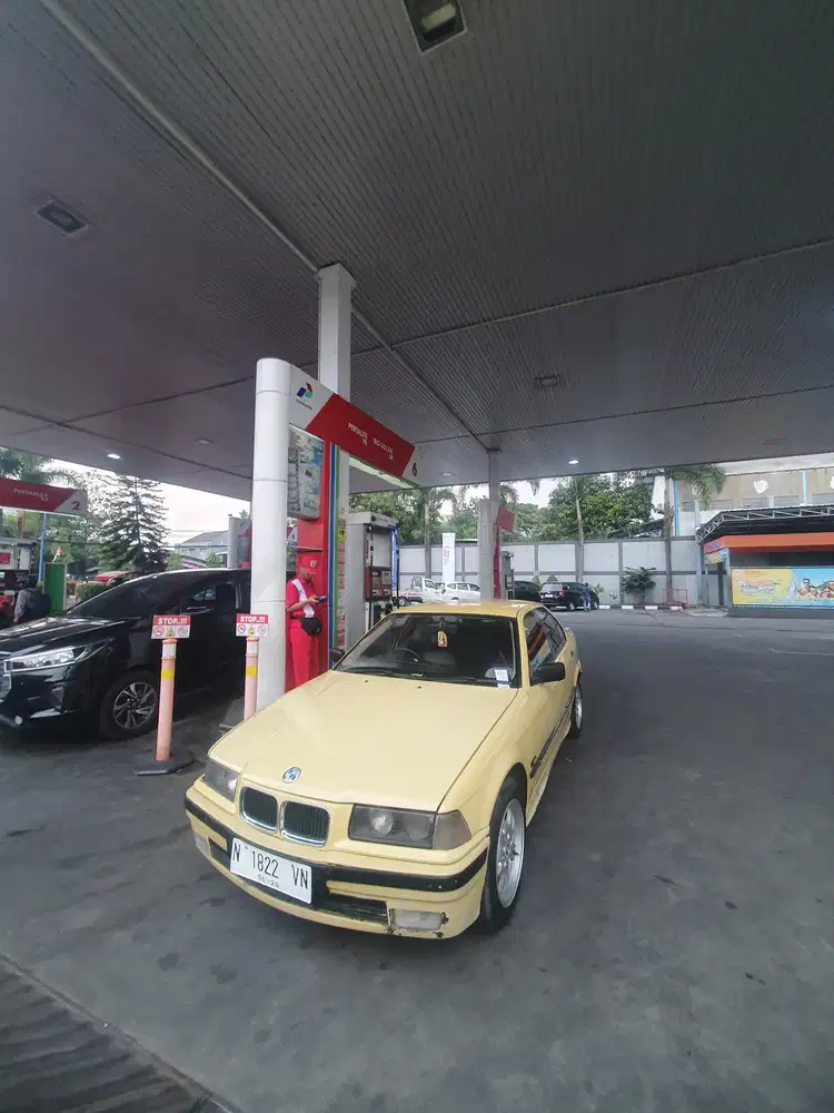 BMW 320i 1995 Bensin