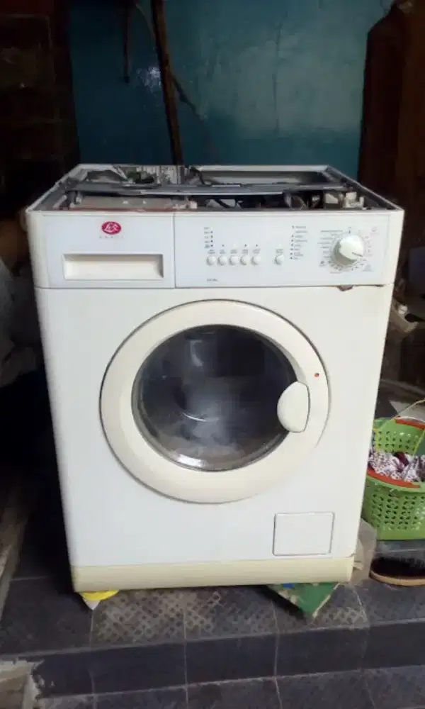 Tampung mesin cuci rusak