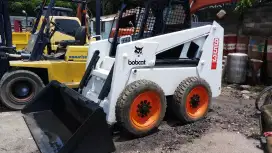 Mini wheel skid steer loader BOBCAT 953 kapasitas 0.8 m3