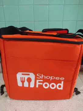 Tas buat bawa makanan warna oranyeee