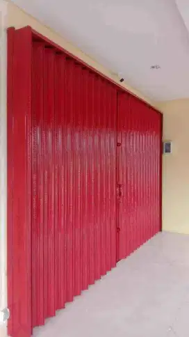 Roling door folding gate