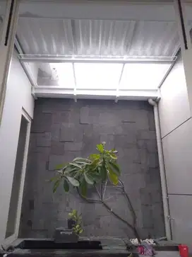 kanopi rooftop sliding kombinasi kaca