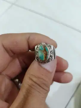 Batu pirus motif orang