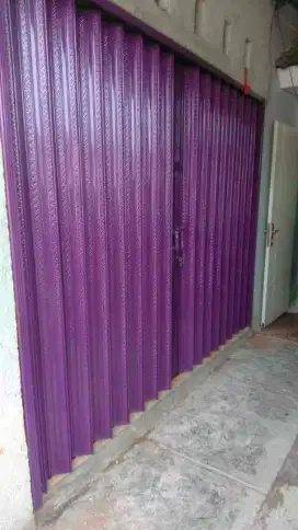 Rolling door folding gate
