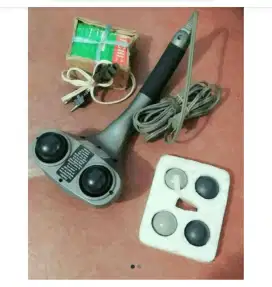 Alat pemijat  .