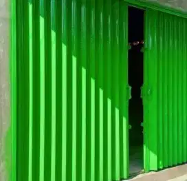 Folding gate roling door