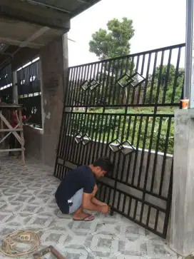 Pagar garasi grc rumah