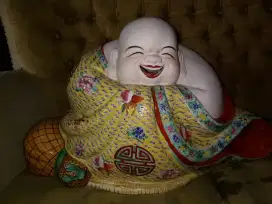 Patung Smiling Budha