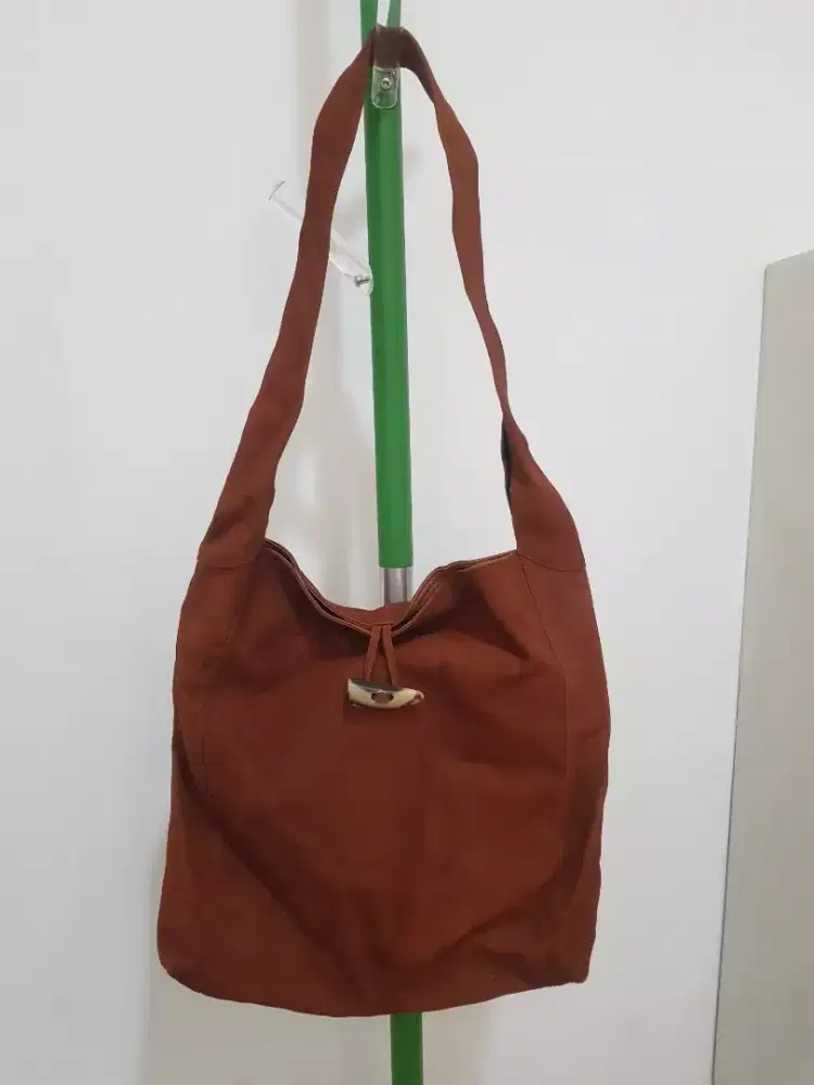 Tas kulit Simon Boue