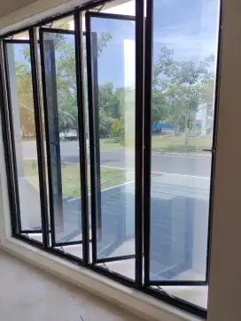 Kaca film gedung dan car