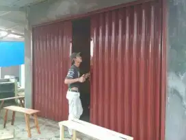 Roling door folding gate