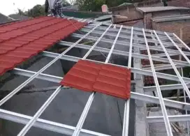 Renovasi atap rumah pasang atap sepandek berpasir dan atap gentngmetal