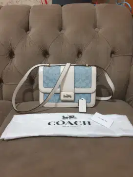 Mulus .authentic tas wanita . Sling bag coach limitet