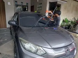 kaca film mobil dan jendela rumah panggilan