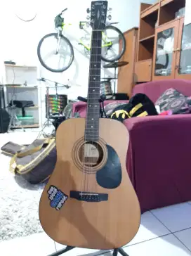 Gitar akustik elektrik merk cort