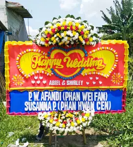 Karangan Bunga Papan - Kehangatan dalam Setiap Detil