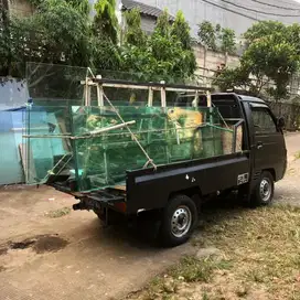 Kaca tenpered bekas