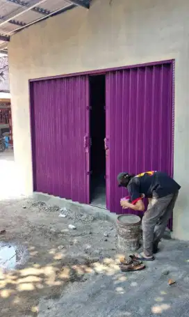 Folding gate rolling door