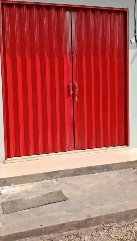 Folding gate rolling door