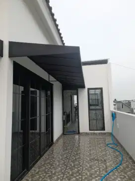 Kanopi auwning kain anti air