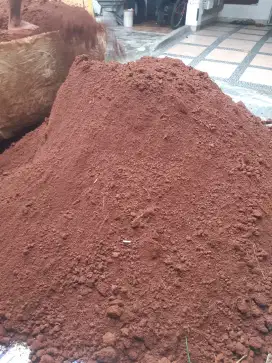 tanah merah urugan, tanah merah urugan Damtruk dan karungan