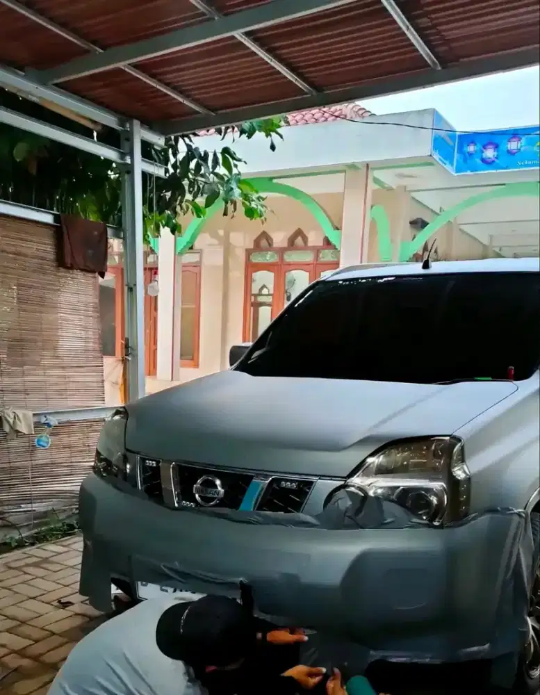 JASA PASANG STIKER DAN SKOTLITE NISAN XRIDE