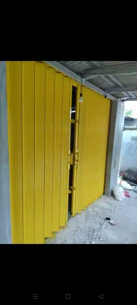 Roling door folding gate