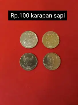 Uang logam seratus gambar karapan sapi.