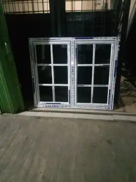 Jendela aluminium dobel plus ornamen