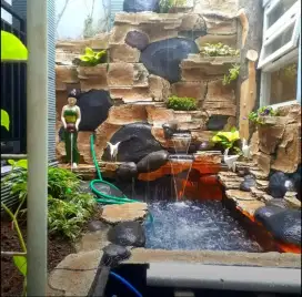 Kolam hias relief air terjun